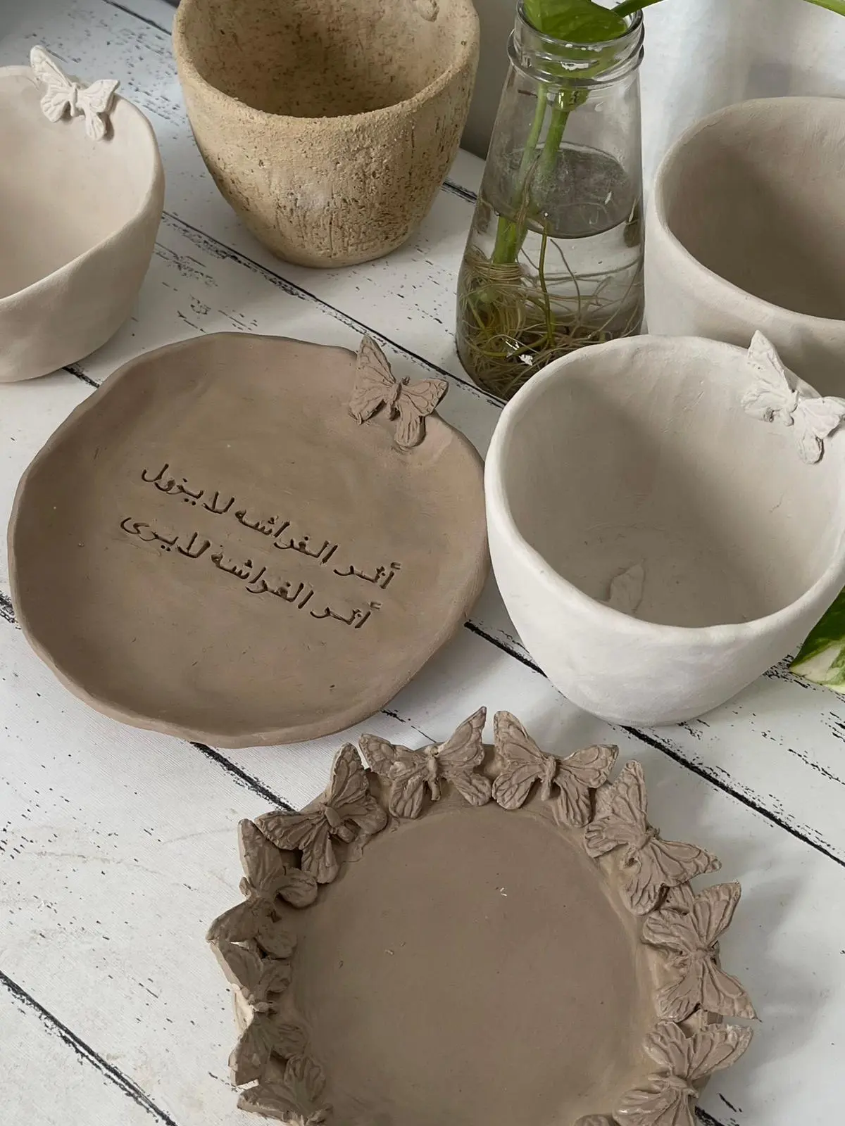 Duha workshop participants shaping clay at Duha Ceramic, Mersin